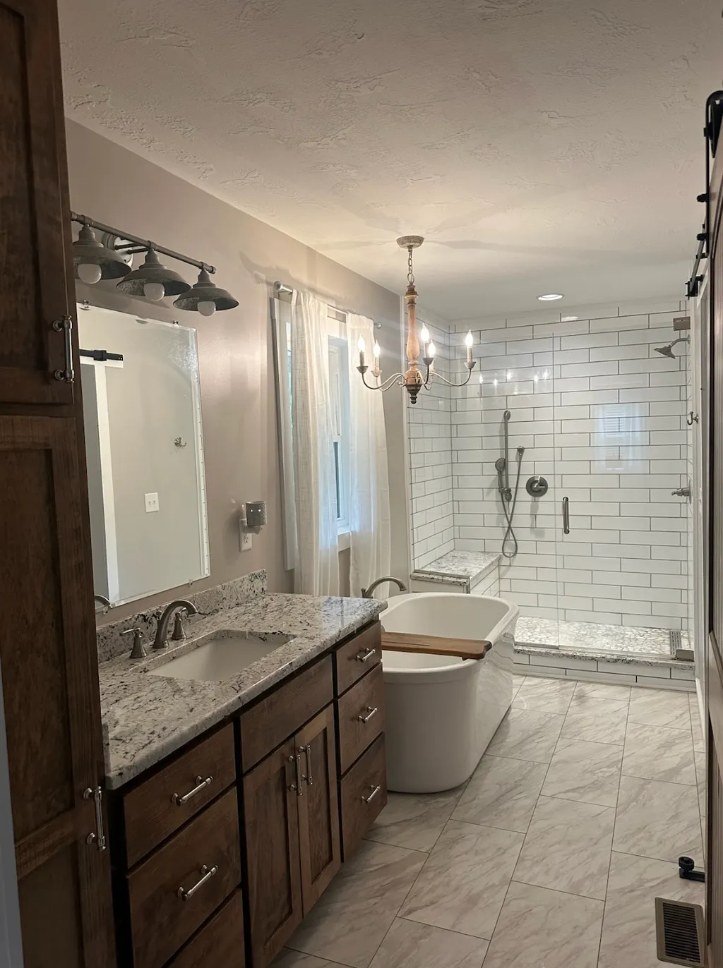 Elegant bathroom with freestanding tub and walk-in shower