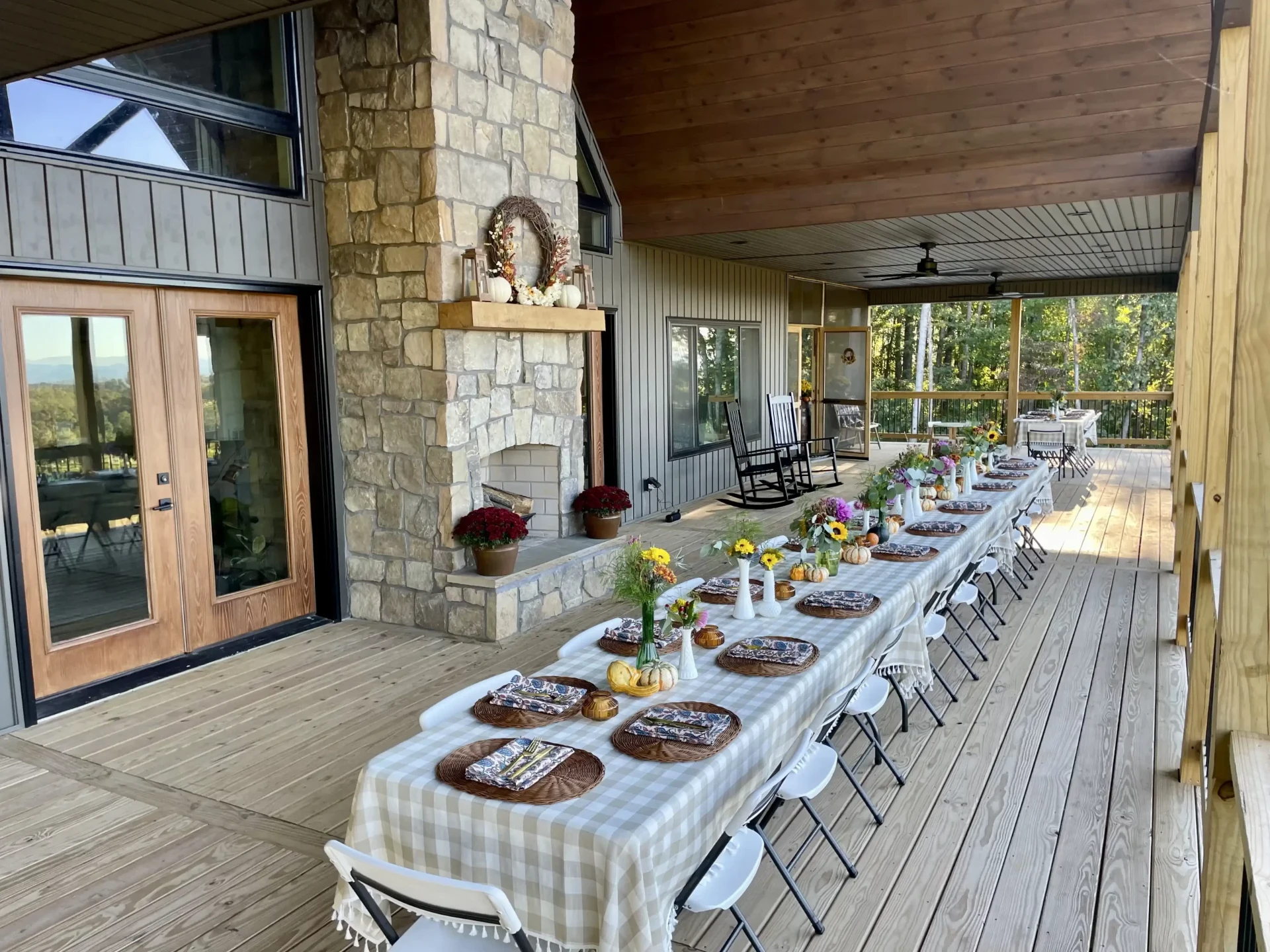 Welborn custom home entry foyer with stone accents and elegant lighting