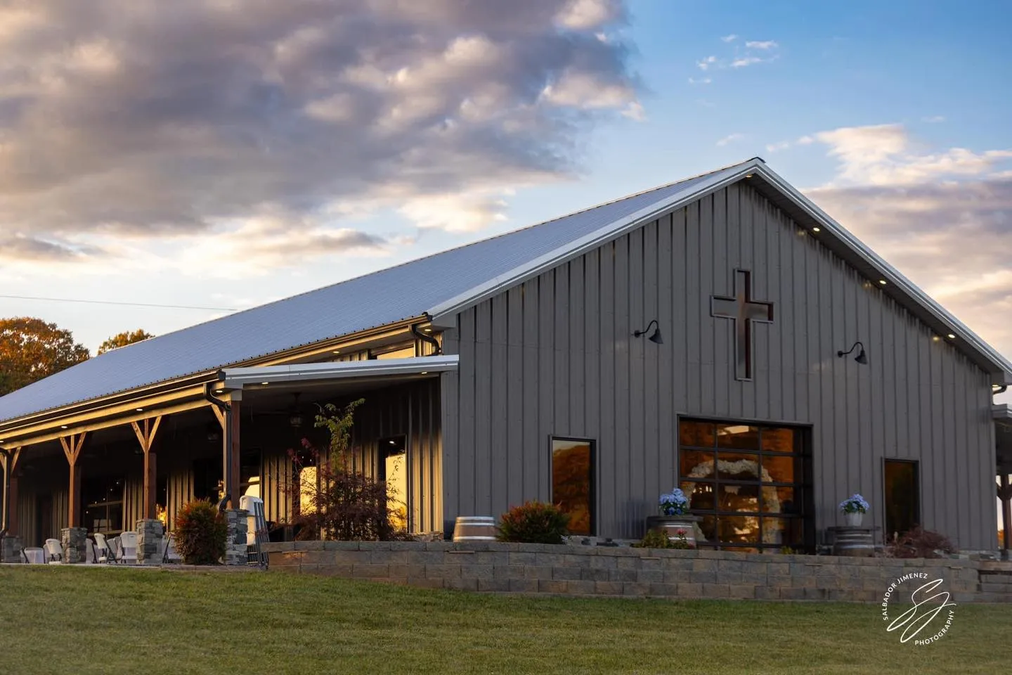 Exterior view of the barn at dusk