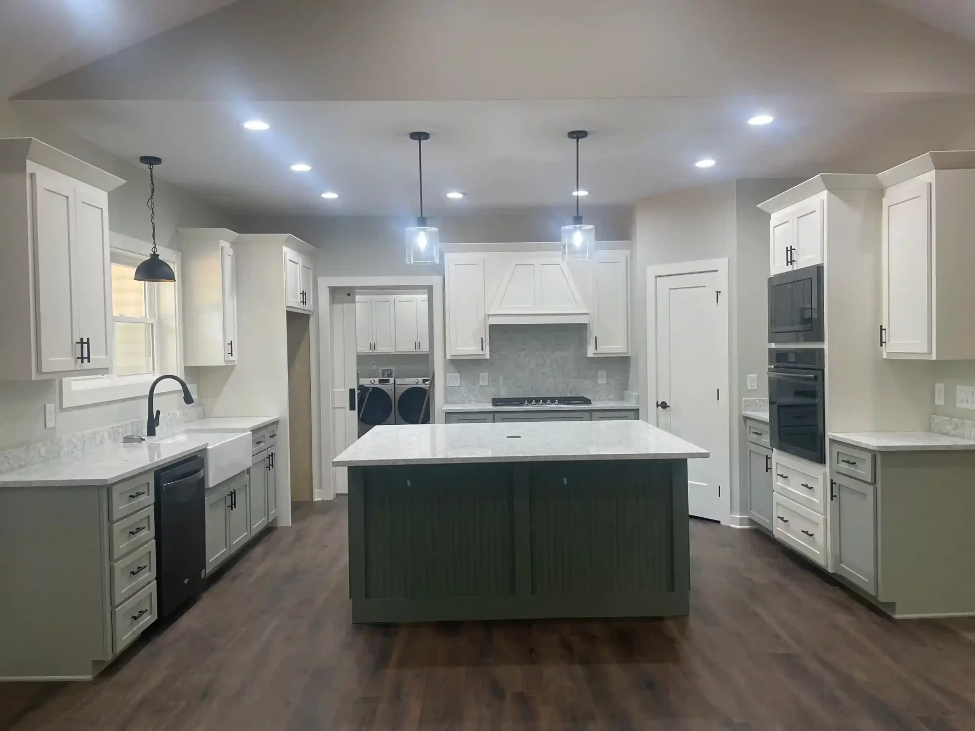Bell project interior great room with stone fireplace and vaulted ceilings
