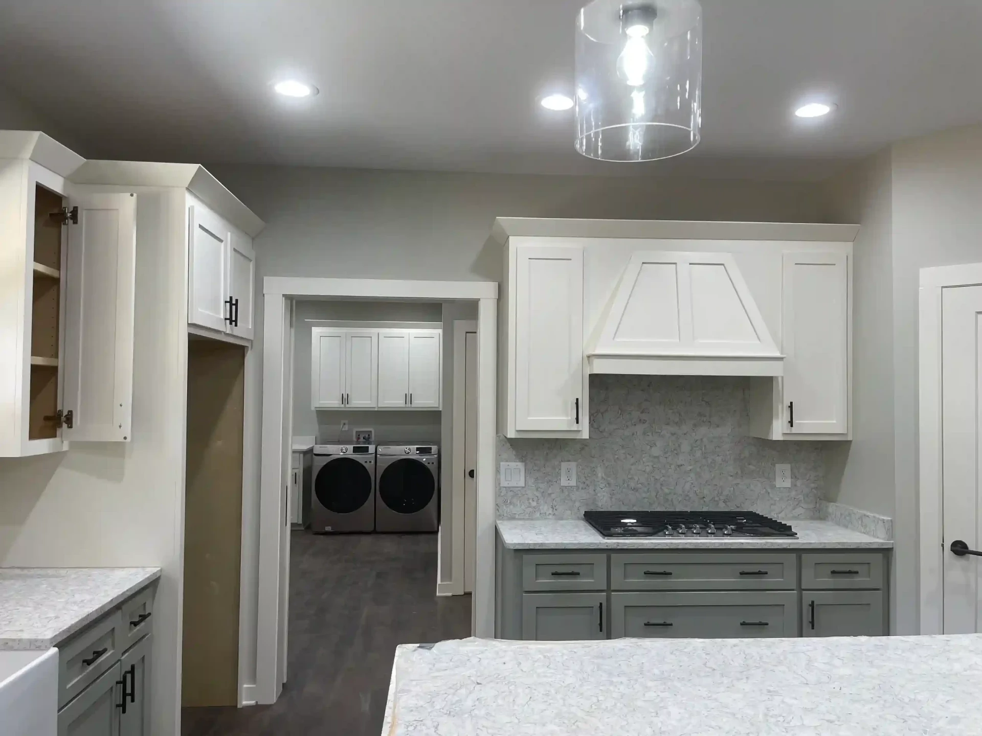 Bell home kitchen with custom cabinetry and granite countertops