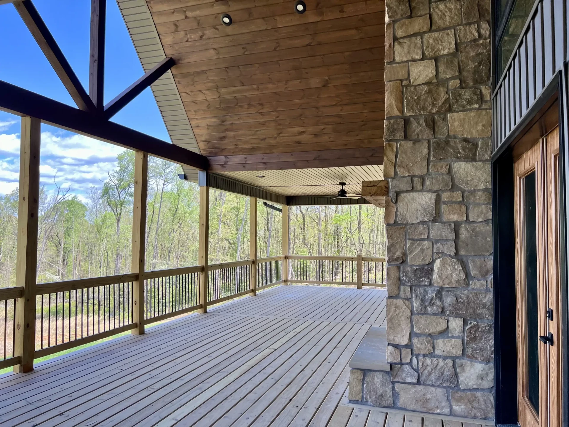 Welborn home master bedroom suite with custom millwork and ceiling fan