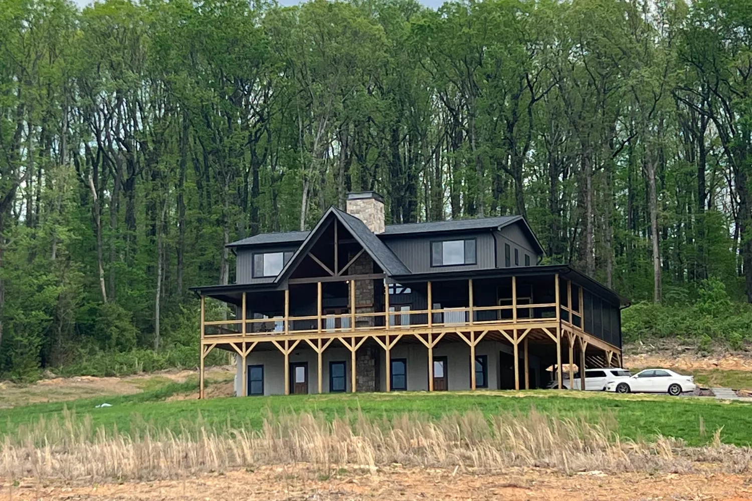 Welborn home interior great room with stone fireplace and cathedral ceilings